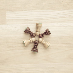 Group of chess pieces from above. Concept of strategy, teamwork and teambuilding.