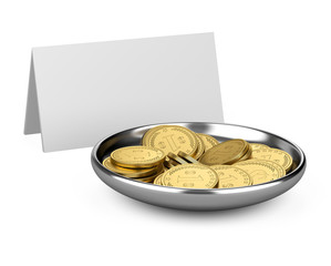 Bowl with golden coins and sheet for writing message.