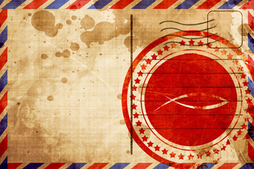 Christian fish symbol, red grunge stamp on an airmail background