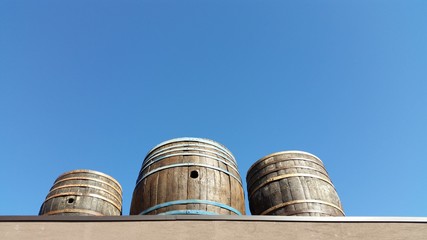 
barrels on the roof for decoration