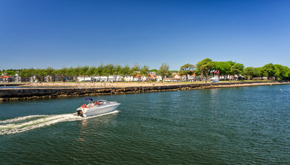 Fototapeta na wymiar Motorboat in the Moss sea port