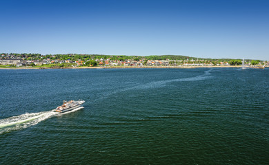 Fototapeta na wymiar Moss sea bay with motorboat - ferry view
