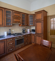 ?itchen with integrated appliances. Wooden design.