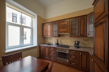 ?itchen with integrated appliances. Wooden design.