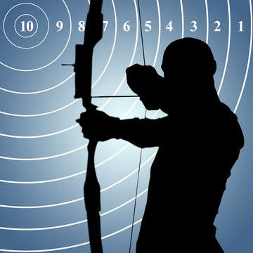 Image of front view of sportsman is doing archery