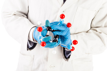 Laboratory researcher with tnt molecule structure