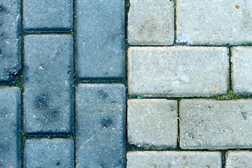 Fototapeta premium Black and grey cement blocks of street