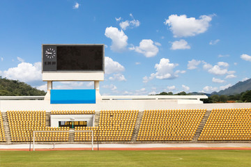 Naklejka premium The stadium with scoreboard displaying
