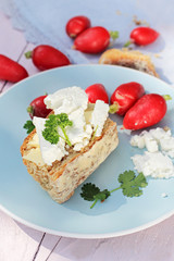 Fresh healthy breakfast, a slice of soda bread with butter and cottage cheese and red radish