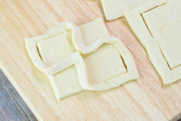 Cut pastry into flower shape.