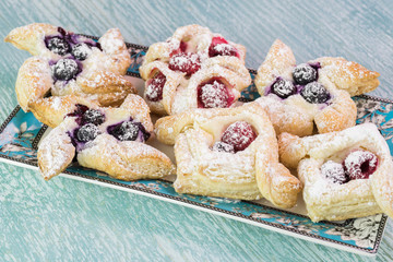 Fresh baked berries cream cheese pastries.