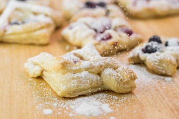Fresh baked berries cream cheese pastries.