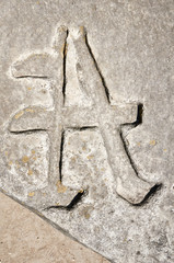 The surface with old cross gravestone