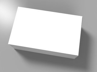 stack of white blank name card on grey backgroun