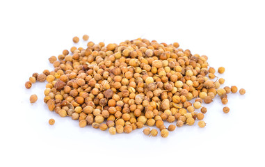 coriander seeds on white background