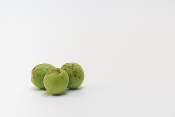 Rotten green plum