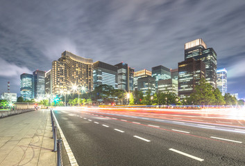 busy traffic on road in downtown of tokyo