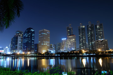 Naklejka premium mirror water with night city Bangkok Thailand