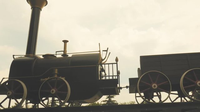 old black locomotive. nostalgic technology background. timelapse