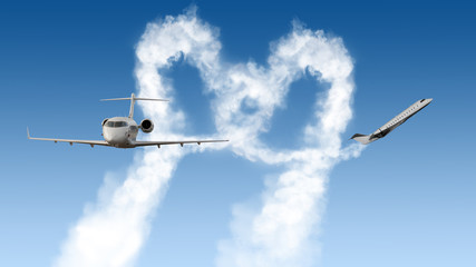 heart shape tracks from two planes on blue