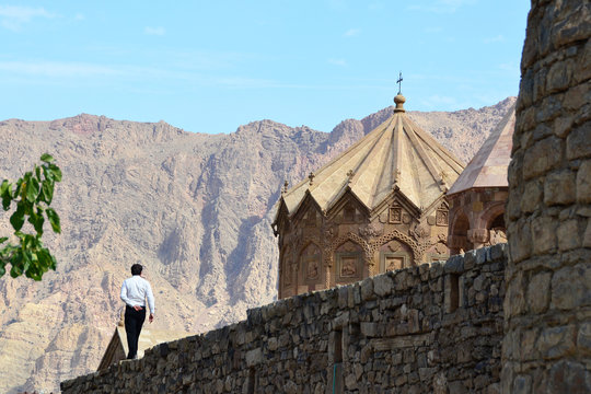 Man Walking On The Wall Of Armenian Church In Iran