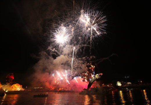   Yearly Great Dragons Parade connected with the fireworks display, taking place on the river Vistula at Wawel. Cracow , Poland