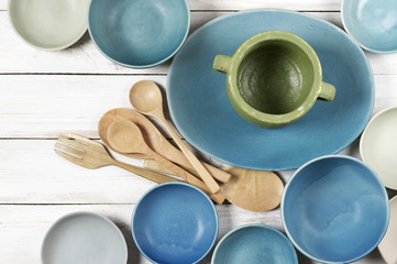 Blue crockery on white wood