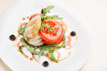 salad with goat cheese and tomatoes in Georgian