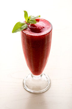 cherry shake with frozen pulp and mint