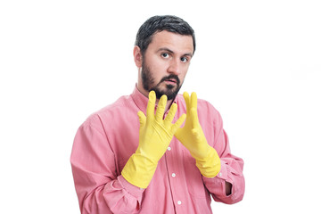 Cleaning man putting latex glove and prepare to clean house isol