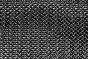 Black fishnet cloth material texture background. Nylon texture. Nylon fabric. Nylon bag for background with copy space for text or image.