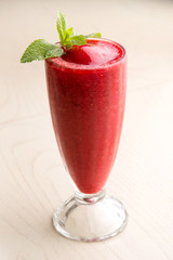 cherry shake with frozen pulp and mint