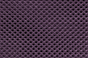 Purple and violet fishnet cloth material texture background. Nylon texture. Nylon fabric. Nylon bag for background with copy space for text or image.