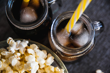 misted bottles of Cola with ice and fresh kettle corn