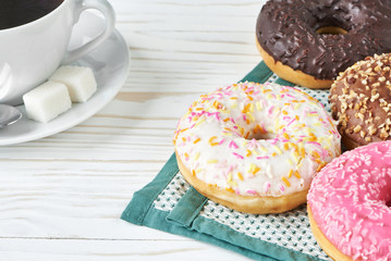 Donuts and cup of coffee