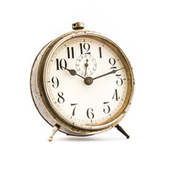 Old alarm clock, isolated on the white background