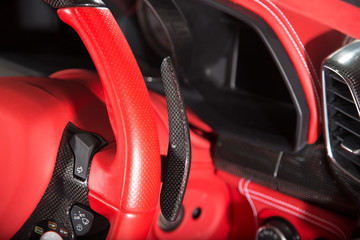 Red supercar interior detail central console  © camerarules