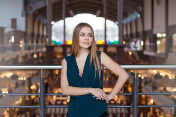 Beautiful young businesswoman in city