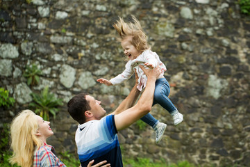 Happy parents with little girl