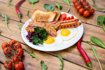 Breakfast, eggs on toast on wood table