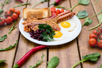 English traditional breakfast on the wooden background