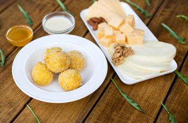 Cheese dish with ingredients for cooking