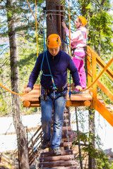 A man in a ropes course