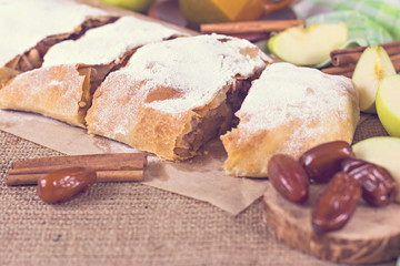 Apple strudel or apple pie  with dates and cinnamon