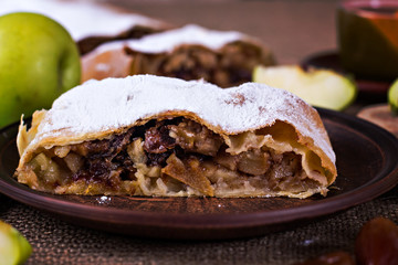 Apple strudel or apple pie  with dates and cinnamon