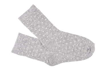 Grey polka dot childish socks isolated.