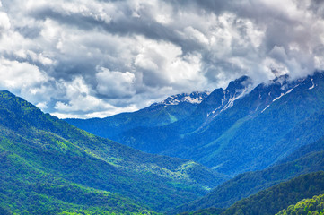 Fototapeta na wymiar Clouds over the mountains