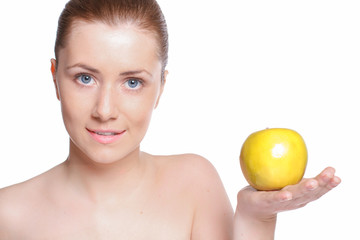 Obraz na płótnie Canvas beautiful woman with clear skin holds apple