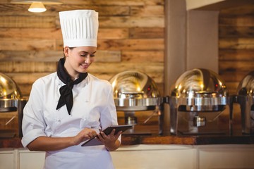 Chef standing with arms crossed