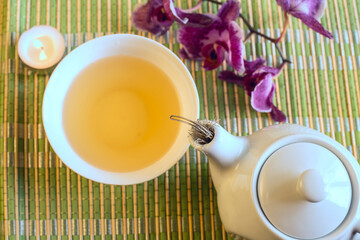 Still life with green tea in a teapot